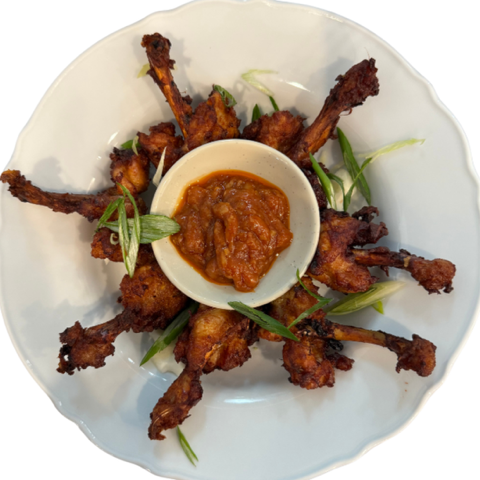 Chicken Lollipop with spicy dipping sauce